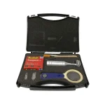 “MarMonix MHC-250 holiday detector components neatly arranged in the foam-lined protective carrying case with electrode handle, magnifier, brush, and tape”